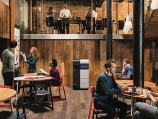 Various groups of people working at the office