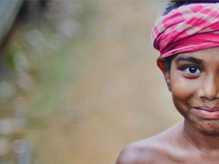 Kid smiling to the camera