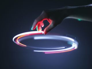 Hand controling light circle in air